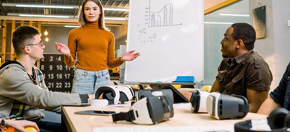 MIMBUS expert guiding students through VR assessment Virtual Career Exploration and Hands-On Skills Development